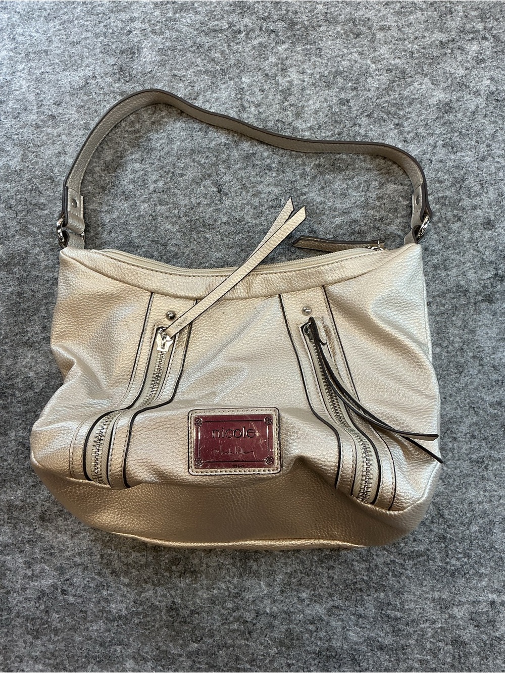 Nicole Metallic Cream Shoulder Hobo with Tassel Zip Accents
